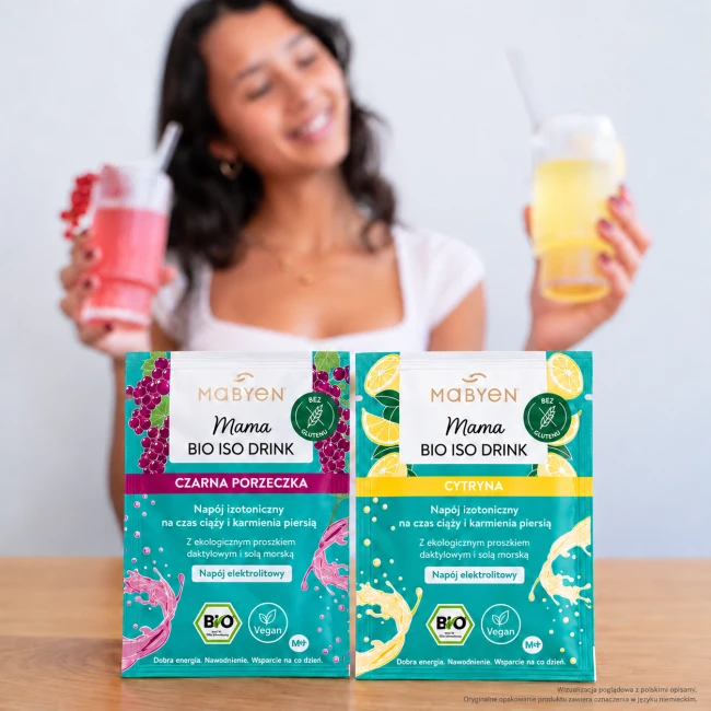Organiczny napój izotoniczny o smaku cytryny – opakowanie na stole, Ratujemy karmienie.png
